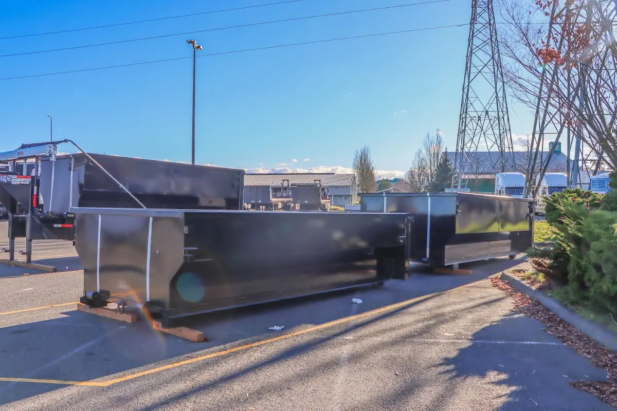 Roll-off dumpster ready for waste disposal at job site for 3 Yard Dumpster Rental in East Liverpool